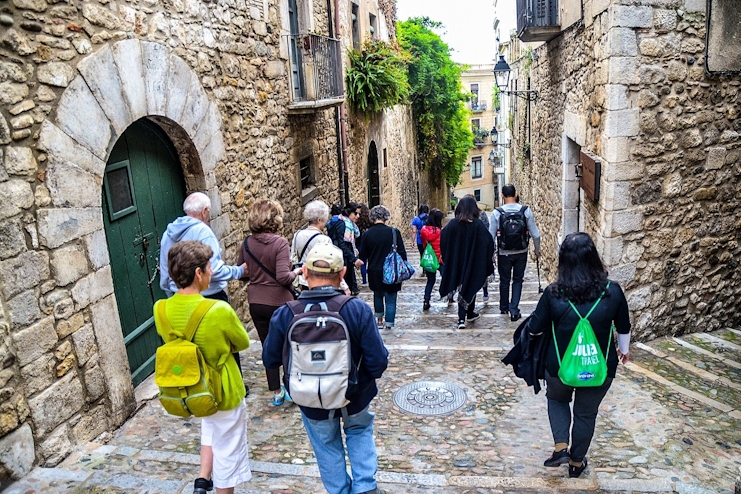 Personas en calles de Girona