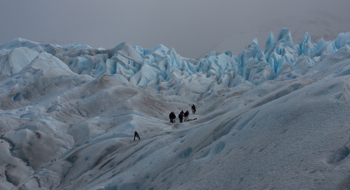 Height view of glaciers and people doing the Perito Moreno Glacier minitrekking